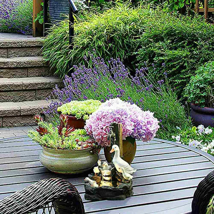 Serenity Pond Duck Fountain – Lightweight Resin Outdoor Water Feature bringing Tranquil Spaces and a Relaxing Ambiance with its delightful duck family.