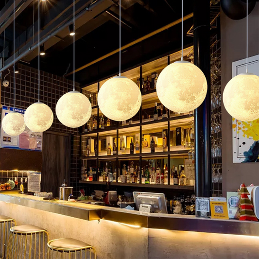 Auralis | Glowing Moon Pattern Hanging Lamp