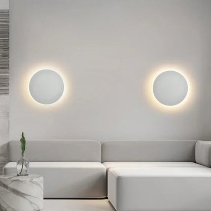 HaloOrb Wall Sconce – Modern Circular LED Light with an Energy-Efficient Design for Home Illumination, providing 10W Warm White Lighting.