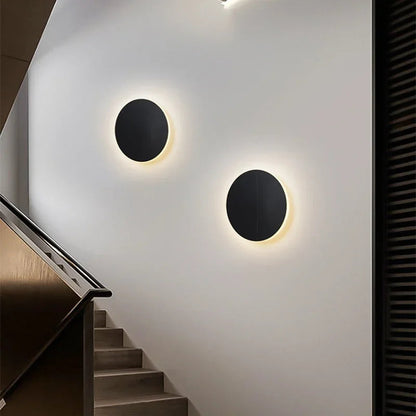 HaloOrb Wall Sconce – Modern Circular LED Light with an Energy-Efficient Design for Home Illumination, providing 10W Warm White Lighting.